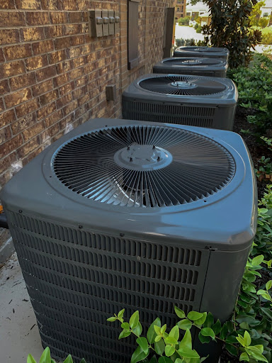 A row of outdoor air conditioning units.