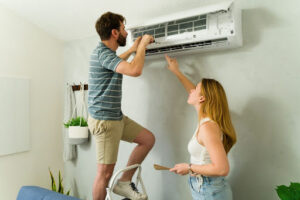 Couple attempting to DIY repair mini-split AC.
